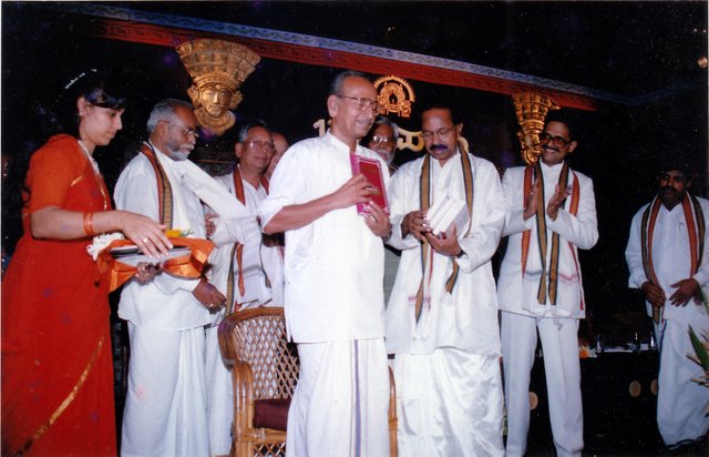 Former CM of Karnataka Dr. Veerappa Moily releasing one of the books of Puninchathaya.