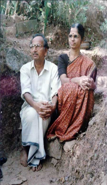 Puninchathaya with his wife Mrs. Vanitha Puninchathaya in front of their Edneer house.